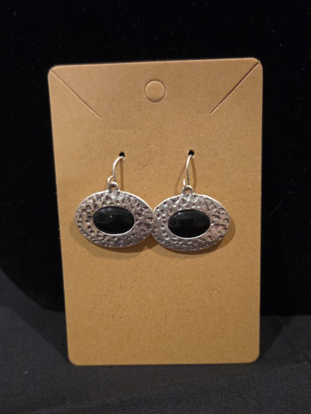 HAMMERED SILVER-TONE OVAL EARRINGS WITH BLACK STONE CENTER
